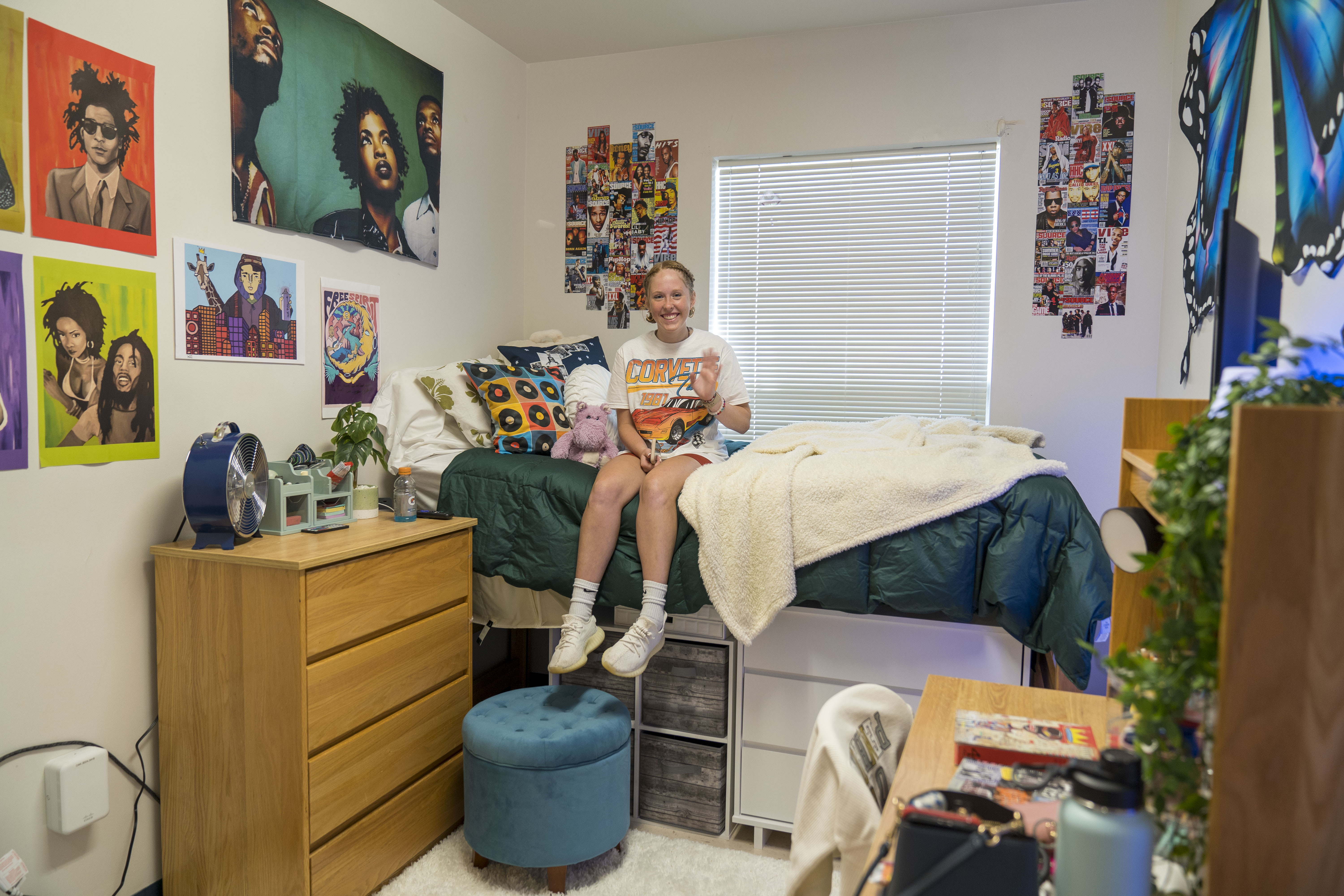 A student in her dorm room on move-in day