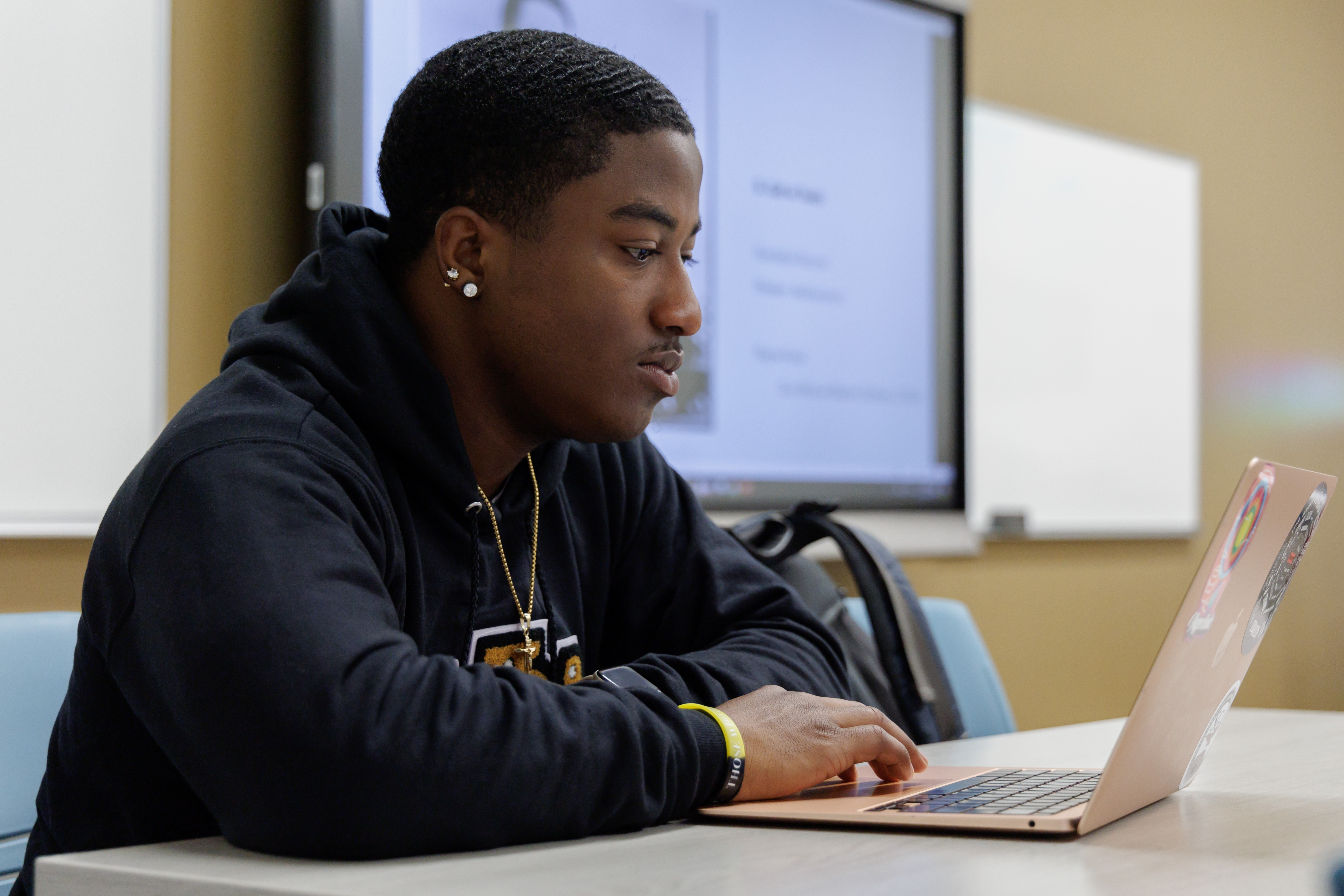UNCP student working on a computer