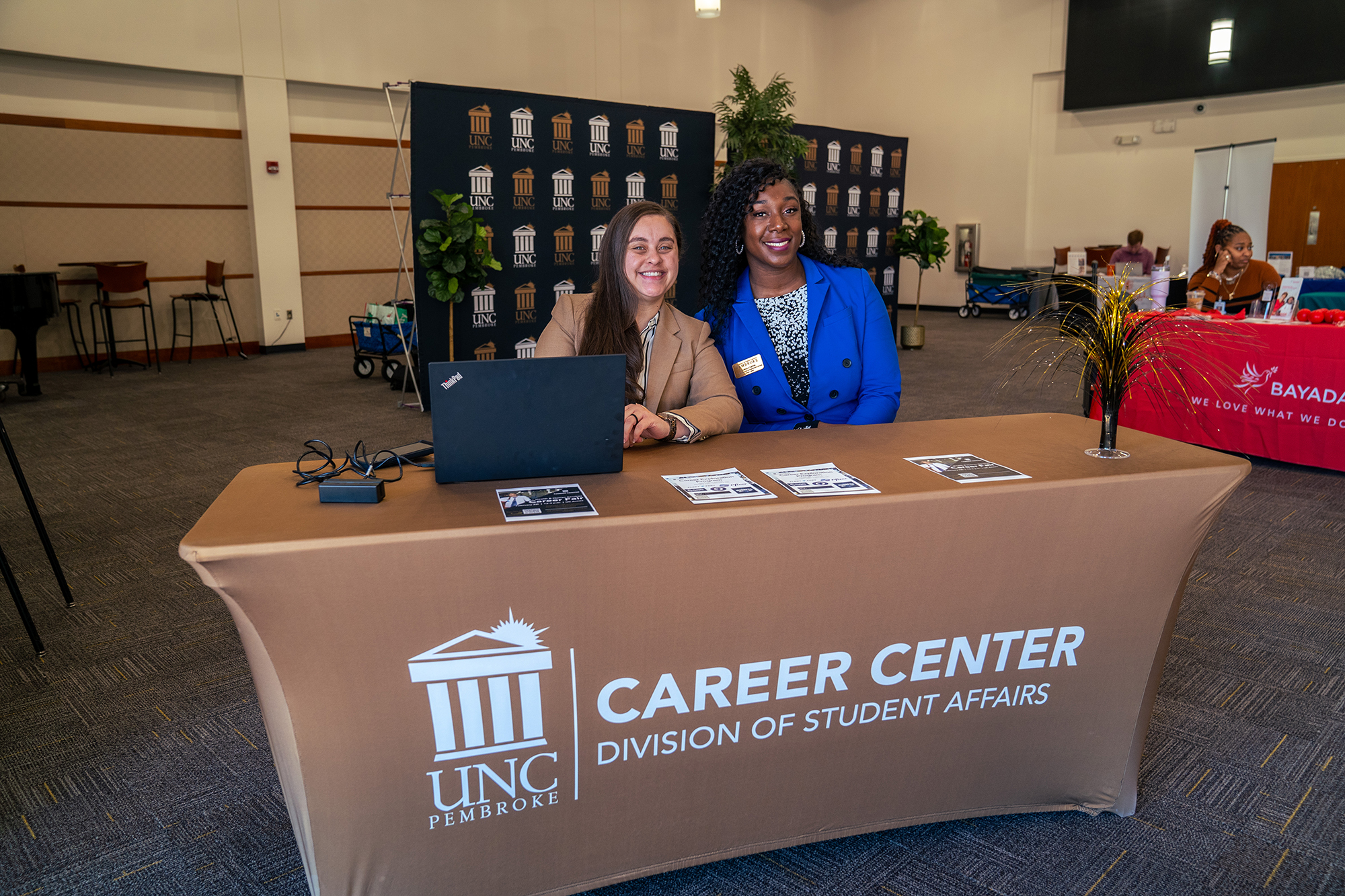 UNCP Career Center table with attendees