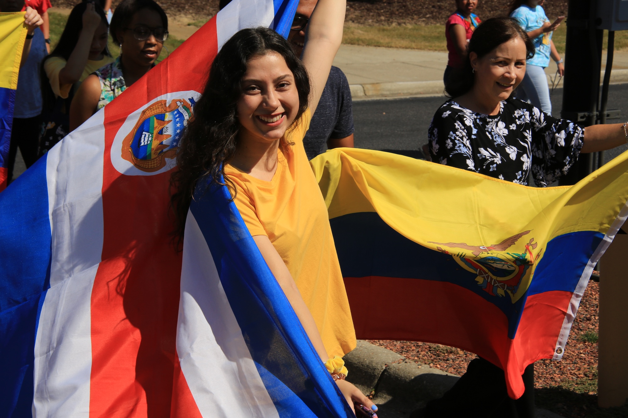 students holding up Costa Rican flag
