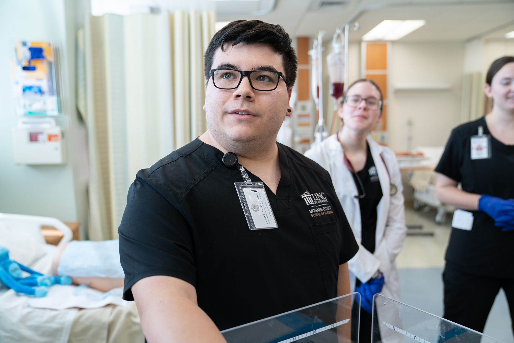 Male BSN student in simulation lab at UNC Pembroke