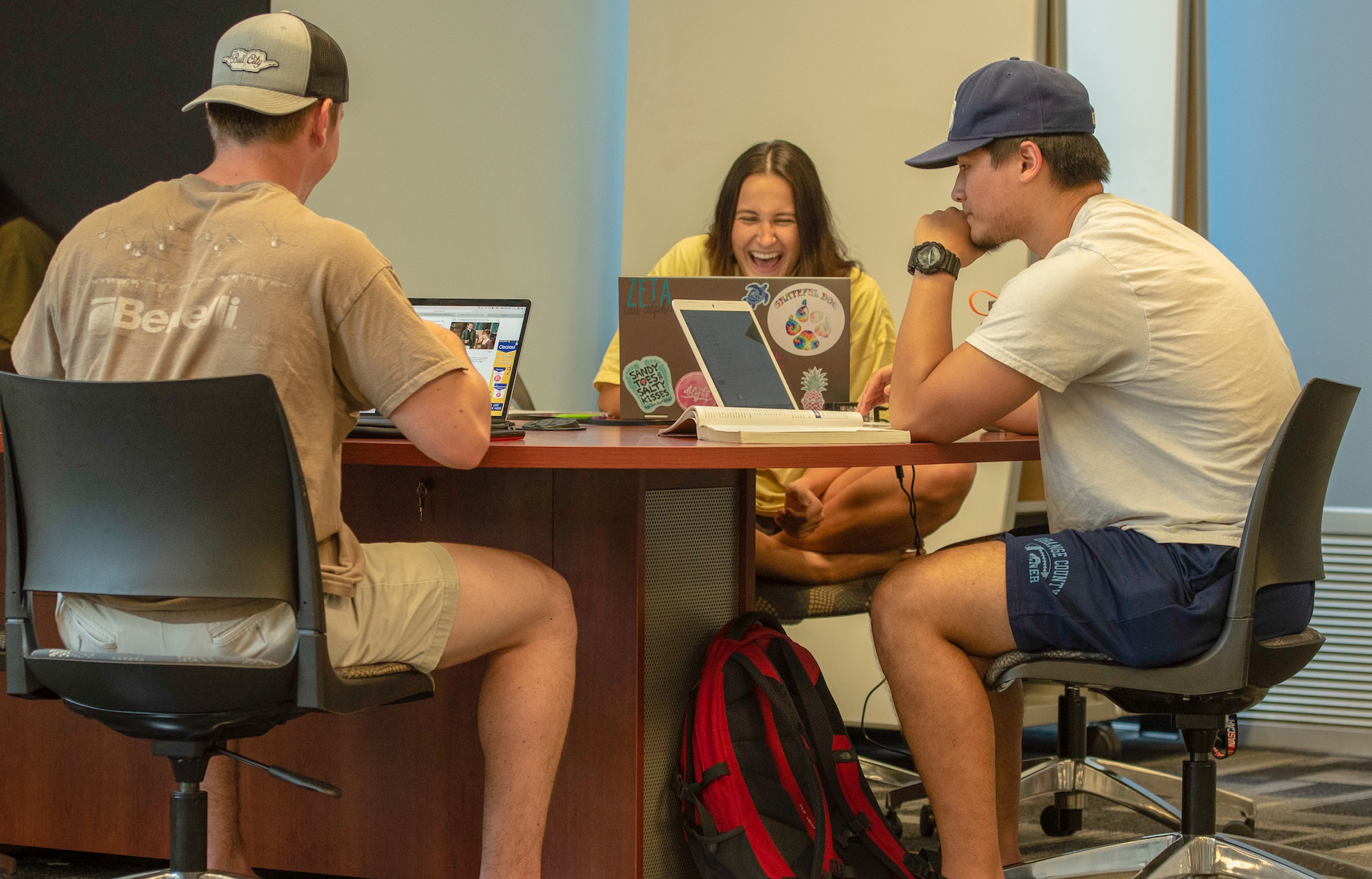 UNCP students work on laptops, representing the TRIO SSS STEM program.