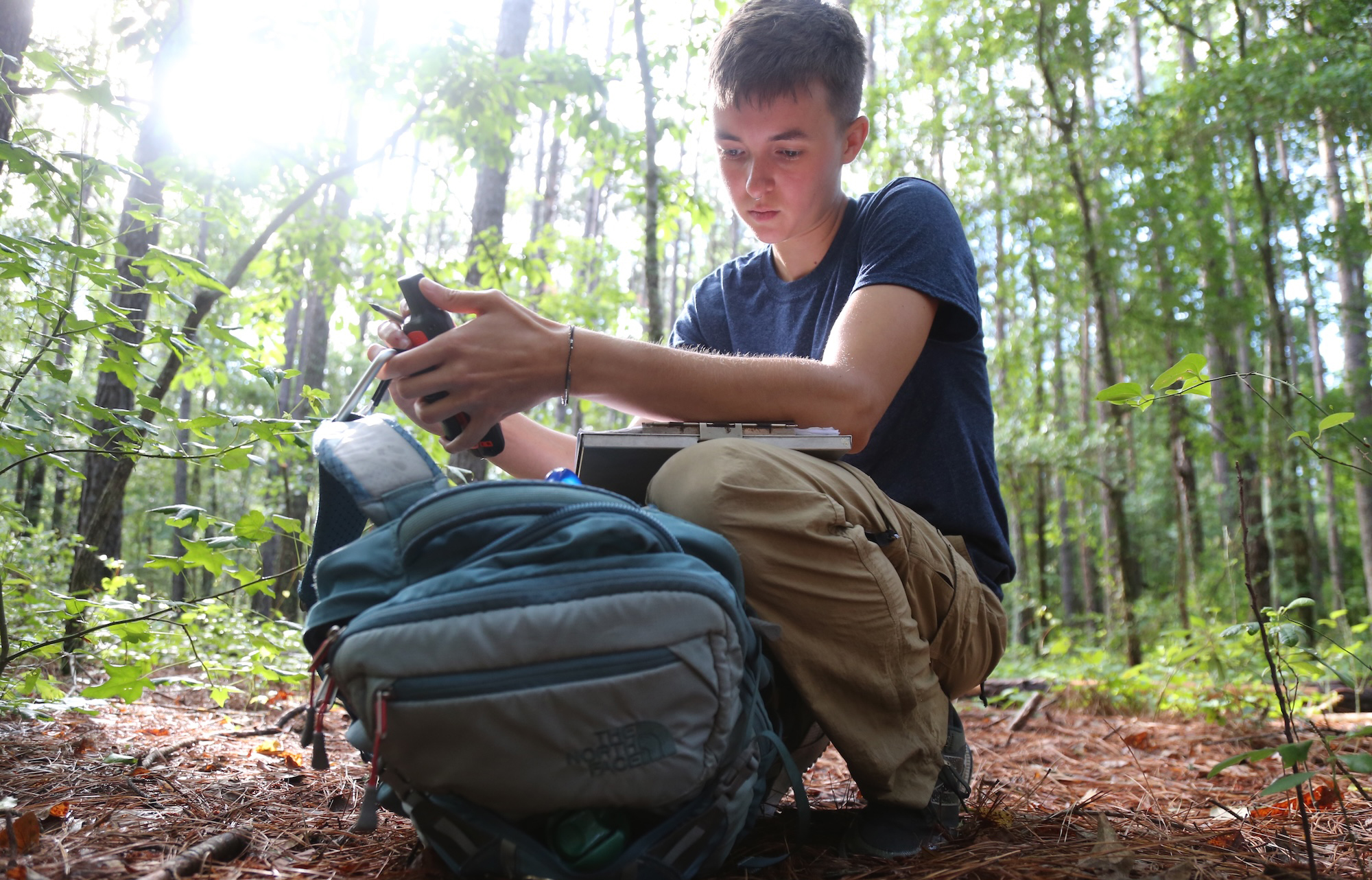 zoology student in the woods at UNCP