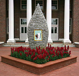 The Arrowhead, a stone and mortar monument in front of Old Main