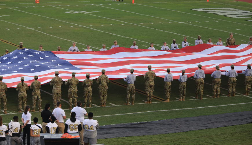 Large American Flag at UNCP military appreciation Football game