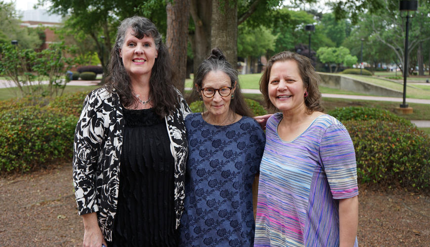 Sara Oswald (center) is retiring after 35 years at UNCP.