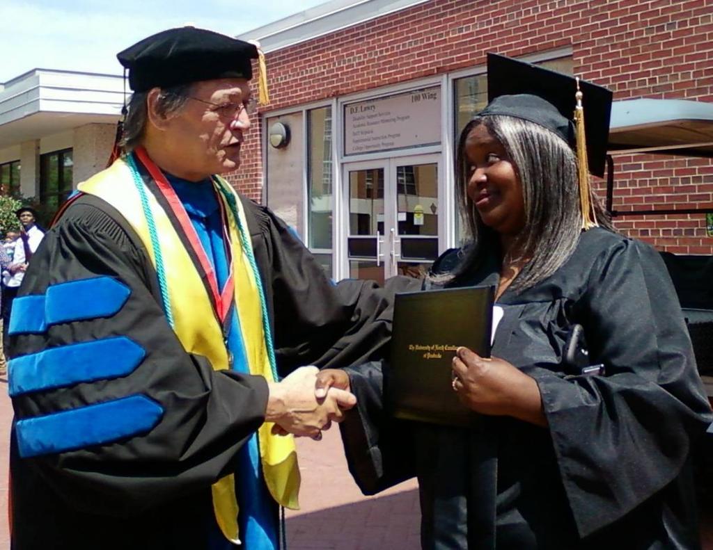 BIS May 2014 Graduate Kelly Hutchinson with Dr. Robinson