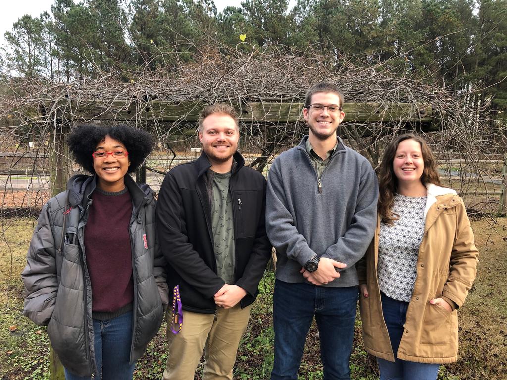 Campus Garden & Apiary Managers Courtney Moore, Cameron Troutman, Grant Wood, and Hannah Swartz