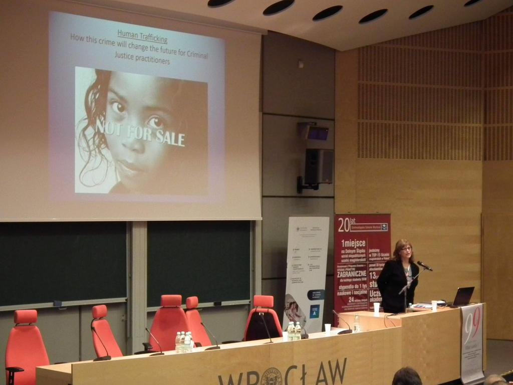 Judith Paparozzi in Poland presenting at a conference