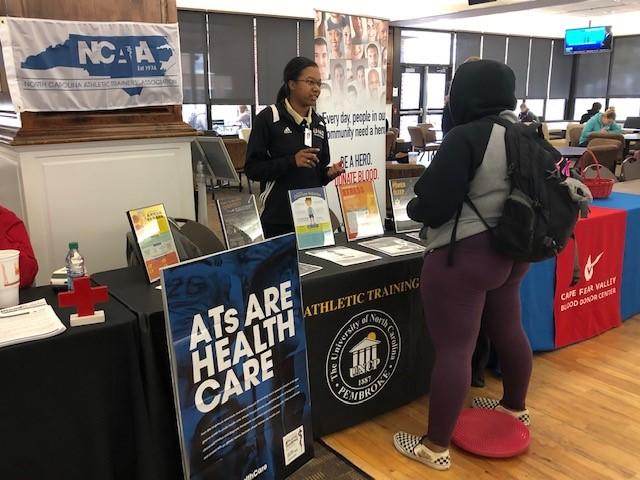 AT student educating students about athletic training.