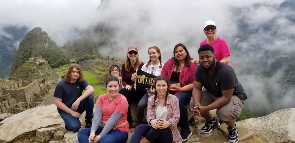 World Languages Program faculty and students visit Machu Picchu, Peru. Pictured here (left to right) are Holden Jolley, Angela Dial, Antonia Uchytil, Dr. Ana Cecilia Lara, Ignayara Hernandez, Sarah Rodriguez, Lena Paz, Professor Milagros López-Fred, and Zachary McDowell.