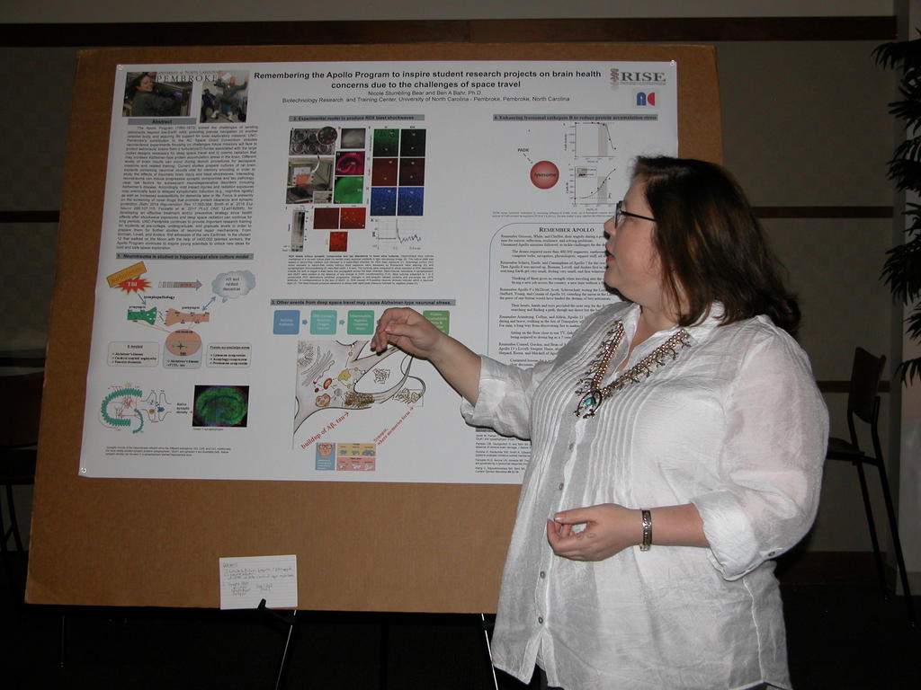 Nicole Stumbling Bear presents her research poster