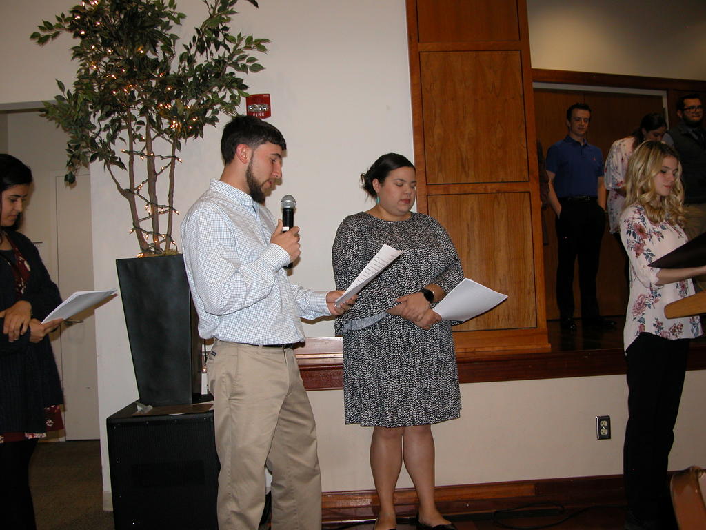 TriBeta officers read biosketches for new inductees