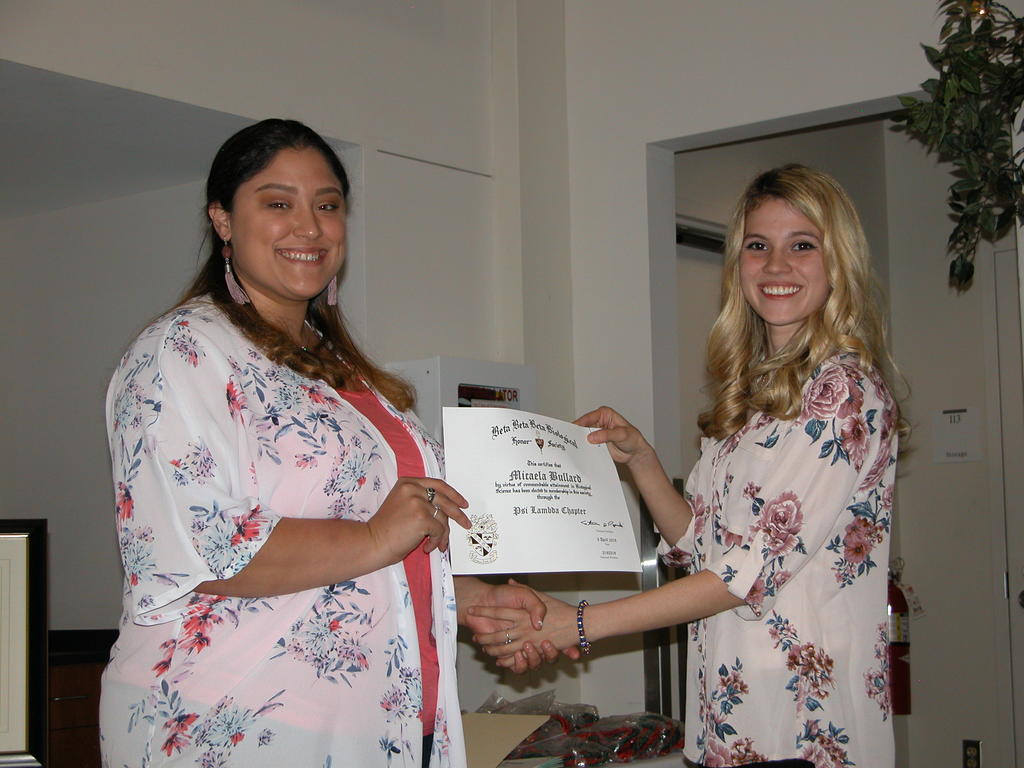 Inductees receive TriBeta certificate