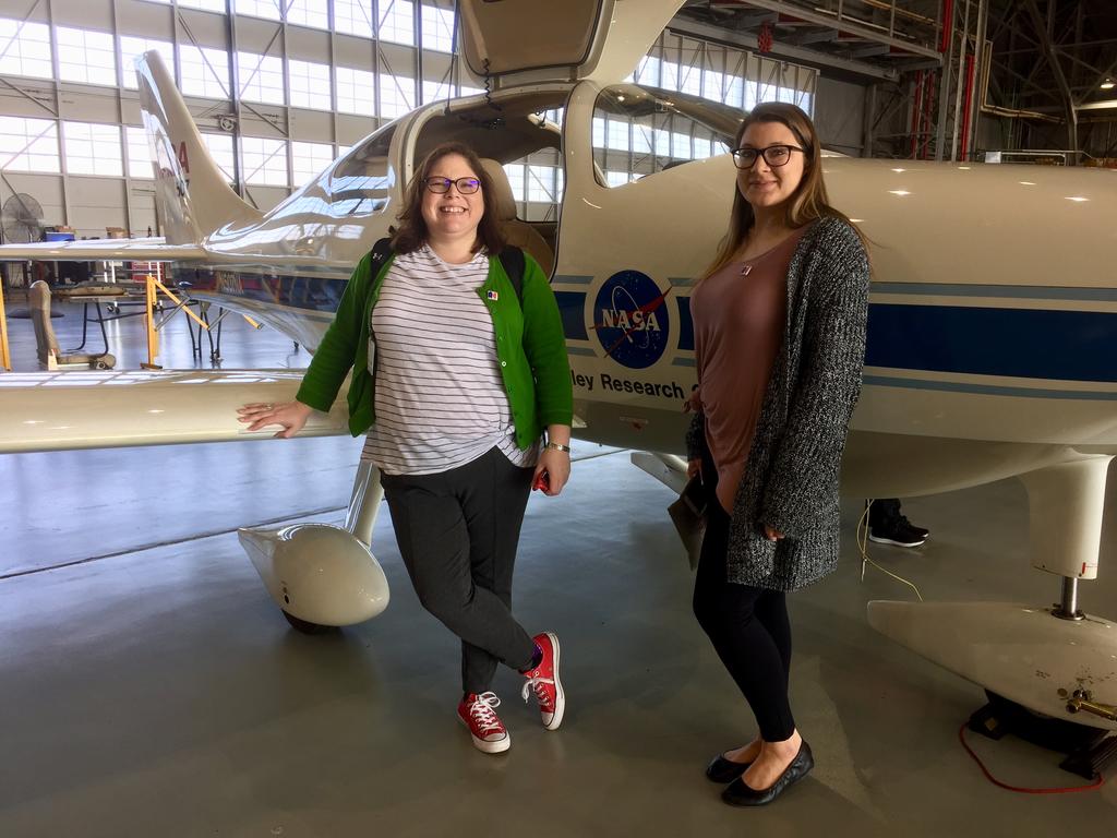 Nicole Stumbling Bear (left) and April Maynor are shown inside the NASA Langley Research Center hangar