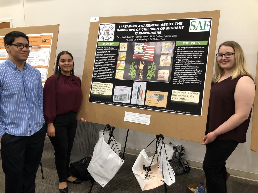 Emily Findling, Jessica Muniz, and Evert Garcia-Guzman shown during their poster presentation at the 2019 PURC Symposium