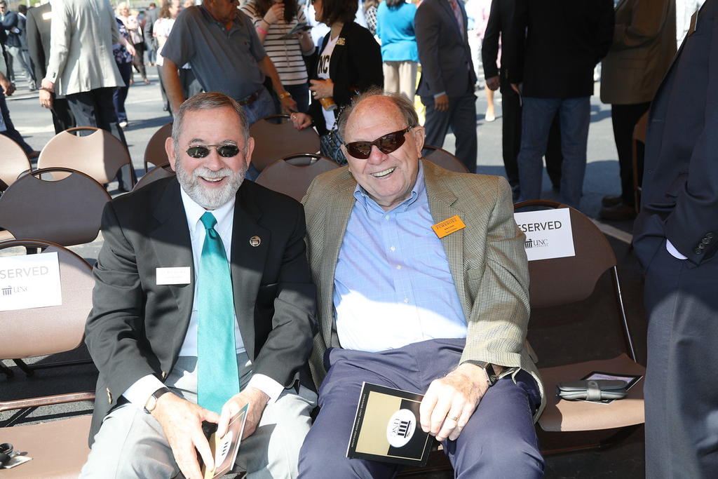 UNCP Trustees Pat Corso, (left) Bob Caton were among the large turnout for the School of Business groundbreaking ceremony
