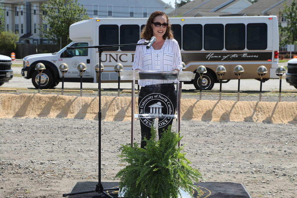 Accounting student Sarah Knepper speaks during groundbreaking ceremony on April 11