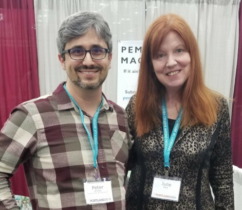 Dr. Peter Grimes (left) poses with Dr. Julie Kane at the 2019 Association of Writers and Writing Programs Conference in Portland, Oregon.