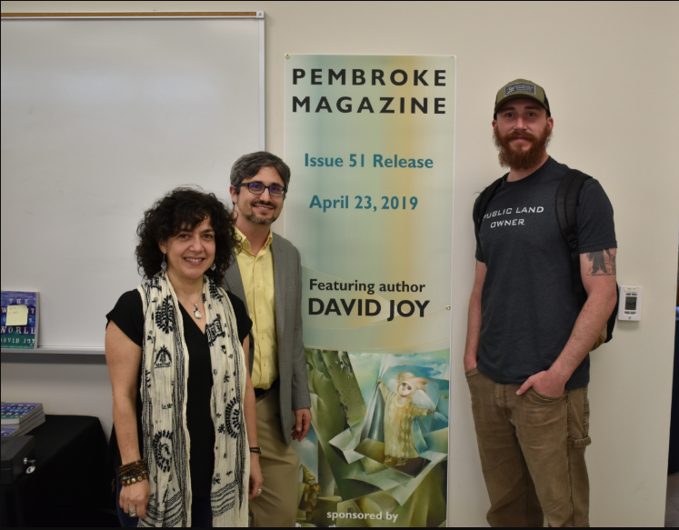 Dr. Michele Fazio (left) and Peter Grimes are shown with best-selling author David Joy (right) during the Pembroke Magazine 51st issue release party.