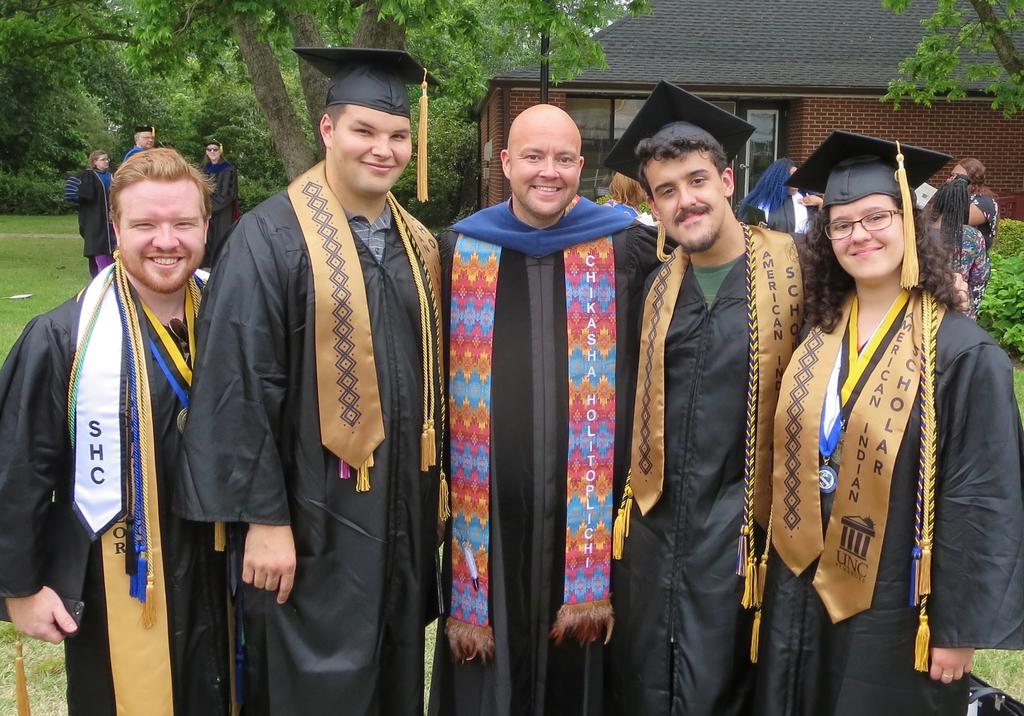 Dr. Conner Sandefur (center) and some of his undergraduate mentees