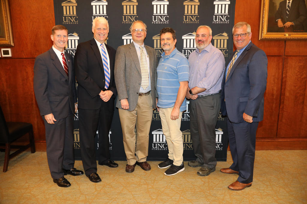 Left to right: Dr. Jerome Lavelle (NCSU) Jeff Frederick, Martin Farley, chair of the Geology and Geography Dept, Bill Brandon, associate professor, Chemistry and Physics Dept, Jesse Rouse, instructor, Geology and Geography Dept, and Provost David Ward