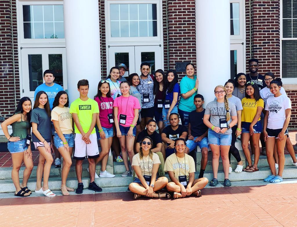 Project ACCESS summer camp youth pose in front of Old Main