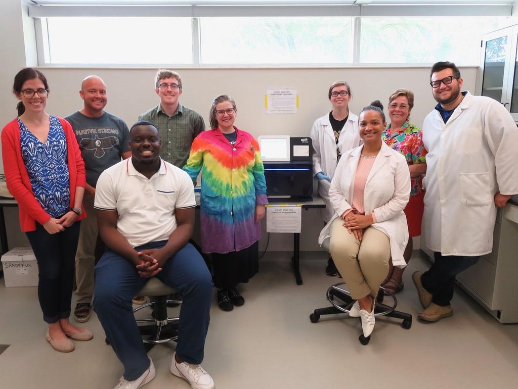 BioMed Research Group, (left to right): Courtney Carroll, PhD; Conner Sandefur, PhD; Will Brennan (of Illumina); Crystal Walline, PhD; Ashley Edwards (student); Maria Pereira, PhD; Tyler Cox (student); seated- Dontae Mosley (student) and Victoria Spencer (student)