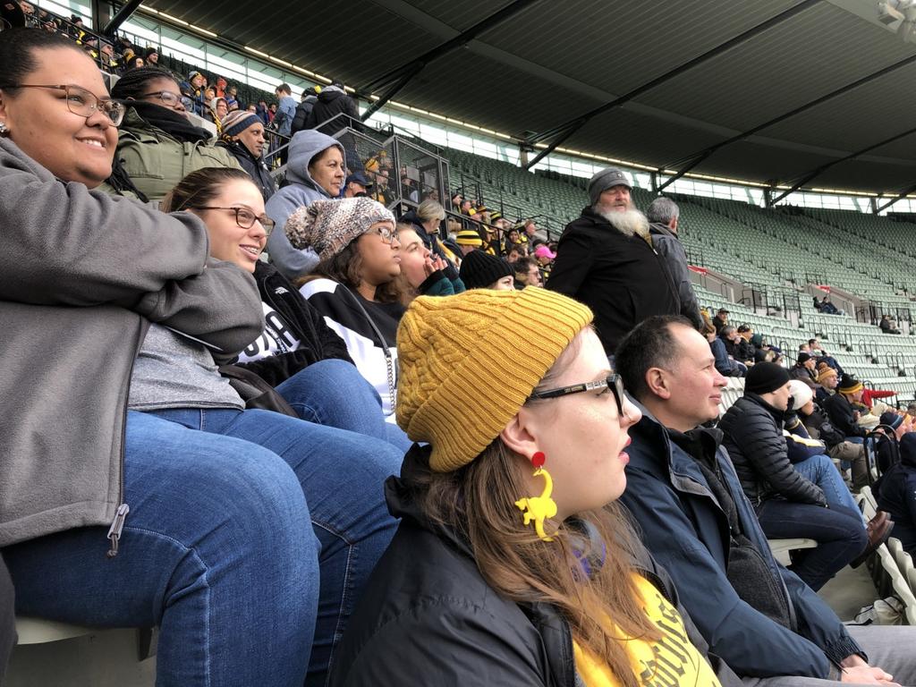 Attending a “footie” game (Australian football) at the Melbourne Cricket Ground on the day before heading home.