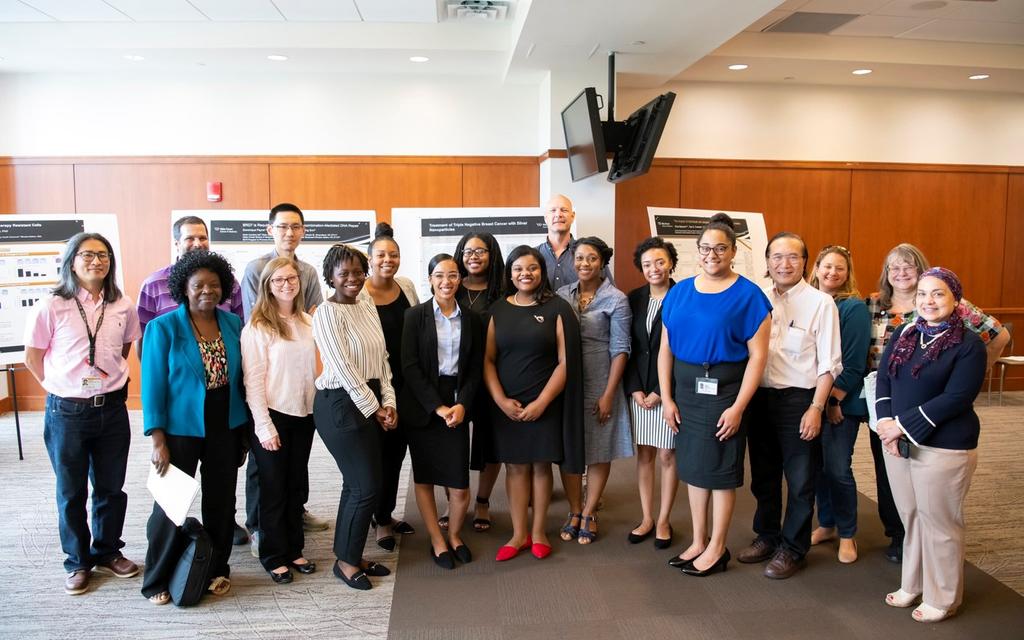 Jessica, fellow student interns, and mentors at Wake Forest Baptist Health's Comprehensive Cancer Center