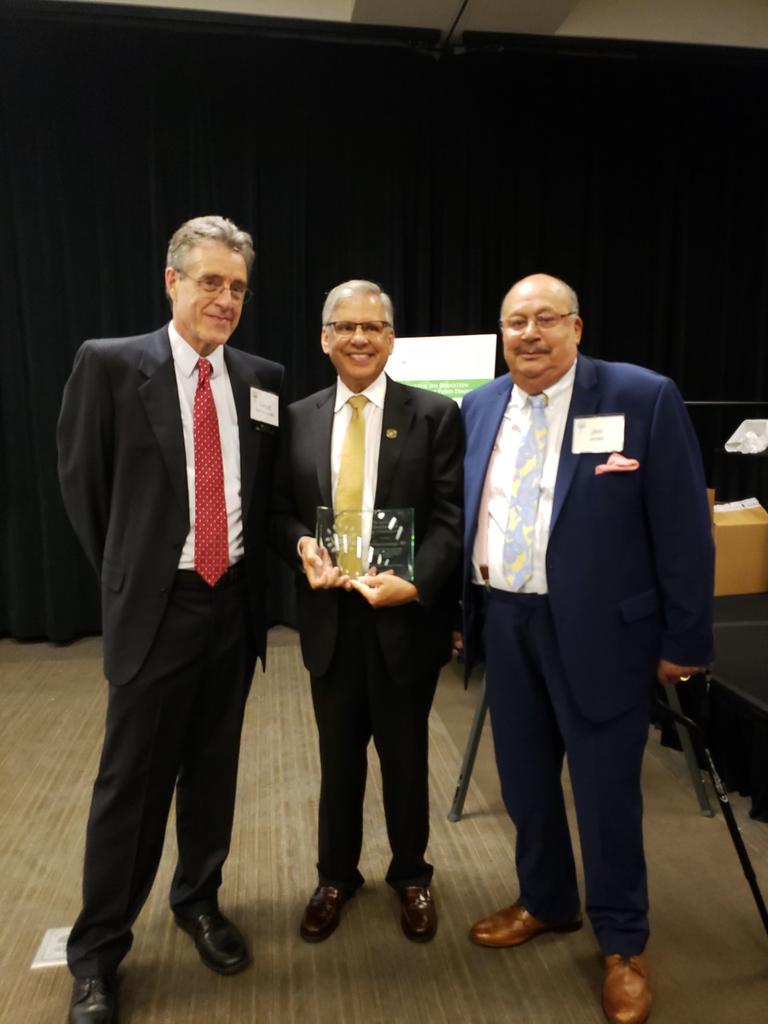 Chancellor Robin Gary Cummings (middle) with Dr. Lloyd Michener, chair of the Foundation for Health Leadership and Innovation, and Dr.  Jim Jones, former UNCP Trustee