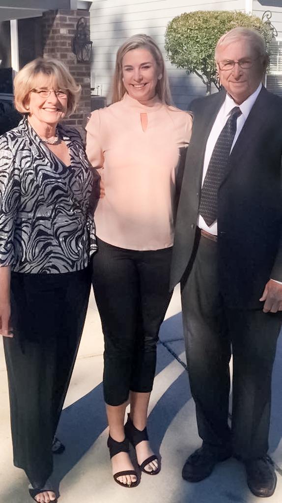 UNCP Trustee and alumna Allison Harrington is pictured with her parents, Ann and Frank Harrington