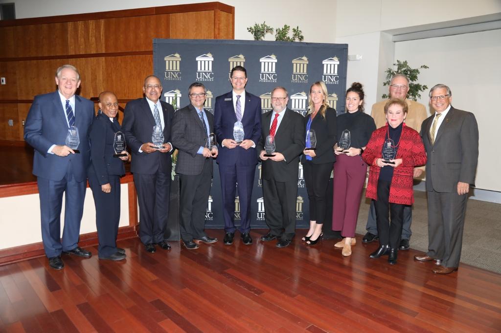 Chancellor Robin Gary Cummings (far right) with recipients of the 2019 Business Visions Awards