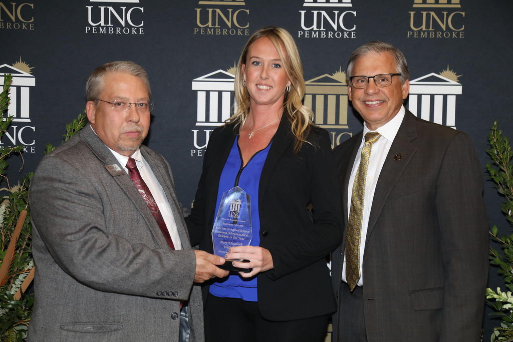 Mary Elizabeth Williford was named Robeson Community College's Business Administration Student of the Year. She is shown with George Pate and Chancellor Cummings