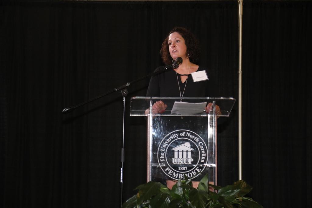 Keynote speaker Aimee Batson shares a heartfelt story about establishing a wrestling scholarship to honor her late husband and former UNCP standout Buddy Batson