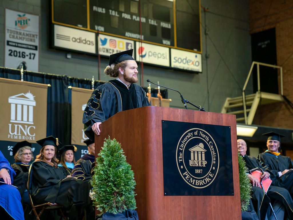 SGA Thomas Crowe-Allbritton speaks during the 2019 Winter Commencement