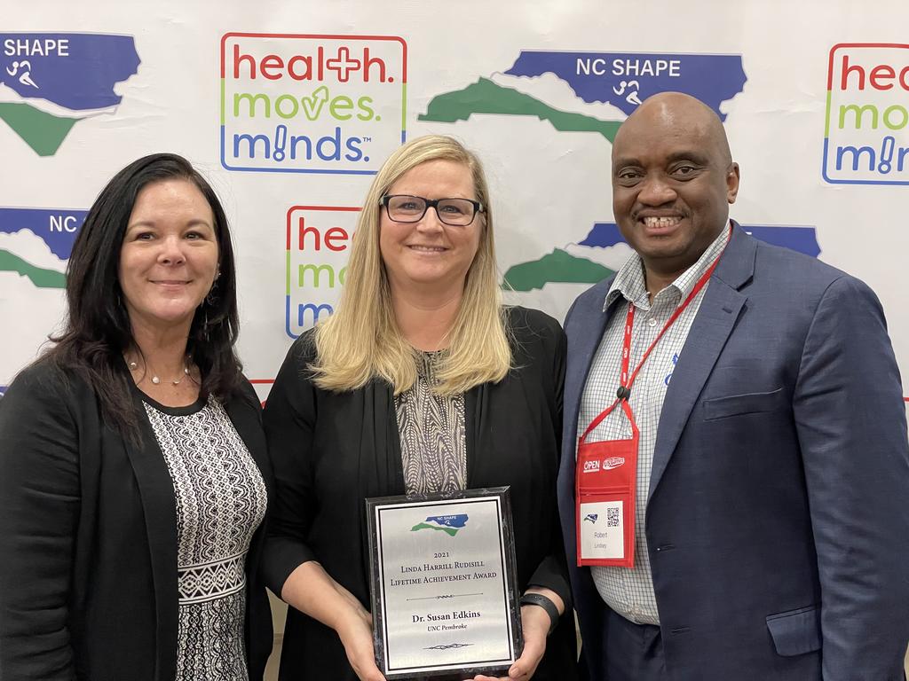 Dr. Susan Edkins, middle, is pictured with Dr. Teri Schlosser (left), UNCP professor and vice president of NCAAHE, and Dr. Robert Lindsay, NCAAHE president