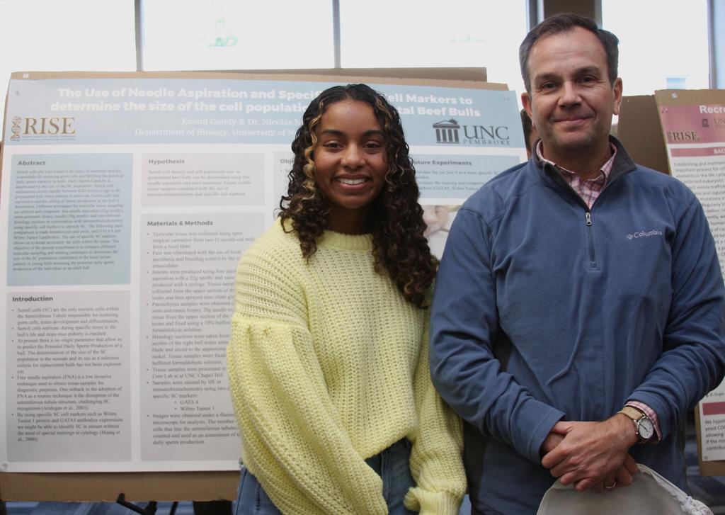 Kalani Gaddy (left) and Dr. Nico Negrin Pereira present research during PURC symposium
