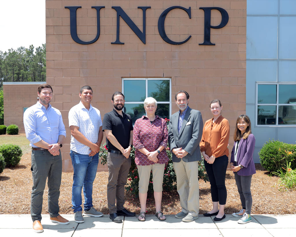 Dr. Ben Bahr is shown with presenters and organizers of the first-ever Optical Microscopy and Imaging Training at UNC Pembroke
