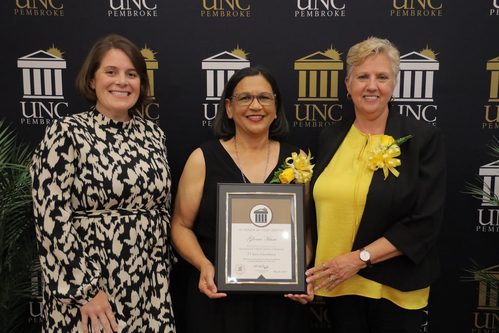 Dr. Christie Poteet (left) Gloria Hunt and Dr. Zoe Locklear