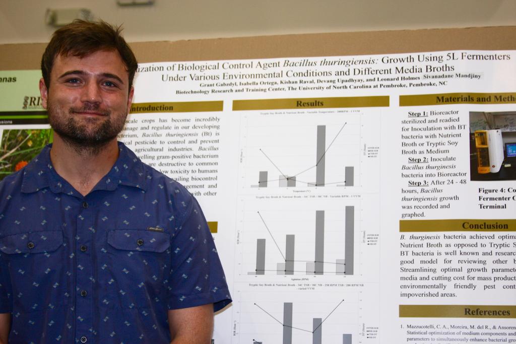 Grant Gabzdyl presents his research poster