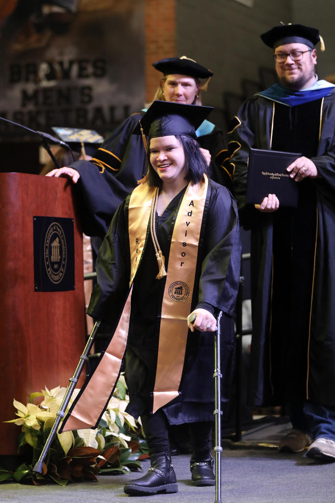 Randi Gabbert crosses the stage at UNCP Fall Commencement on December 10, 2022