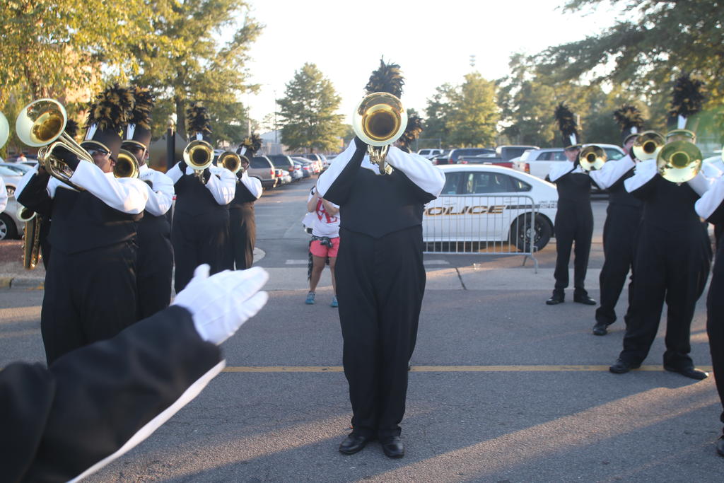 The 2016 band performs for the tailgating crowd