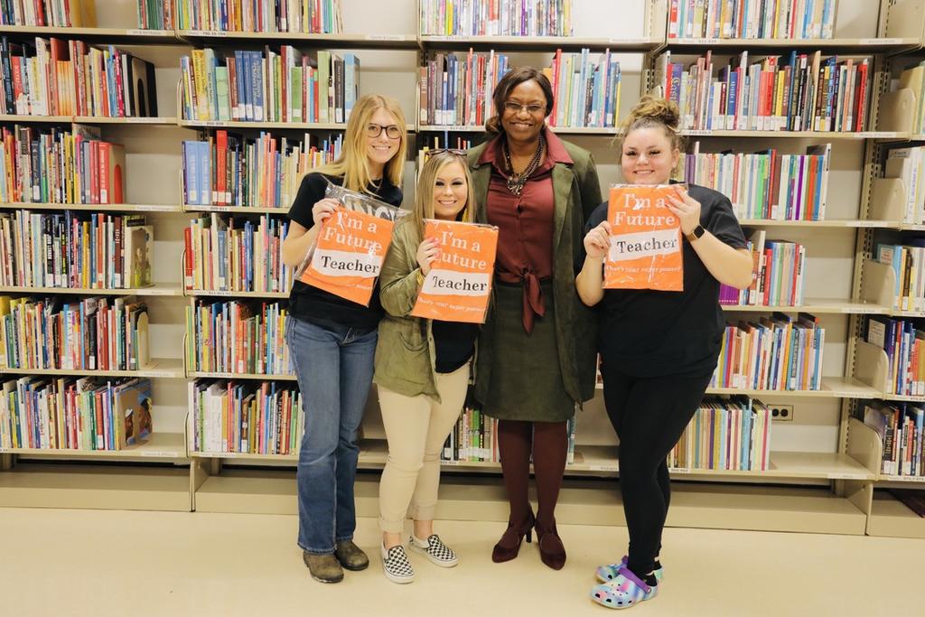 BranchED CEO Cassandra Herring is pictured with future Brave educators Kensey Thurmond (left) Natalie Ludlum and Brittany Hovis