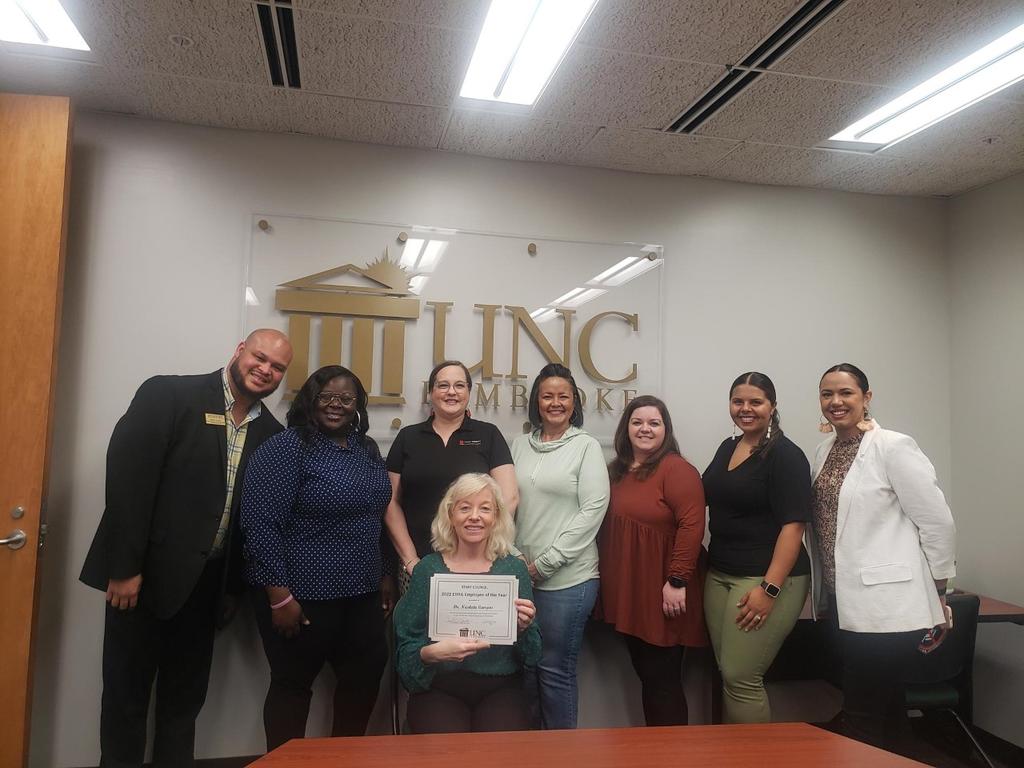 UNCP Staff Council presents Dr. Nicolette Campos (center) with the EHRA Employee of the Year award