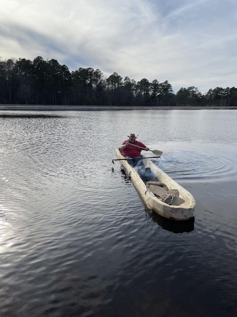 Kevin paddling canoe.