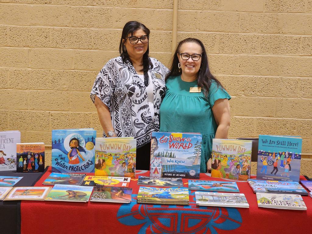 Dr. Connie Locklear (left) and Dr. Kim Sellers gave away free books at the Parent Reading Workshop