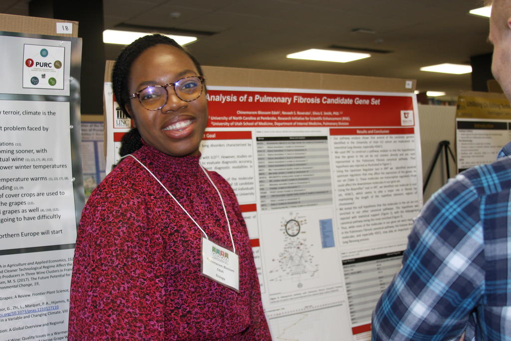 Blossom Edoh presents her research during the 2023 PURC symposium
