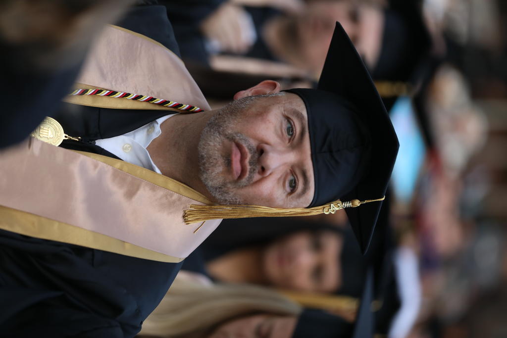 Frankie Hunt listens to the keynote address at The Graduate School commencement on May 5, 2023