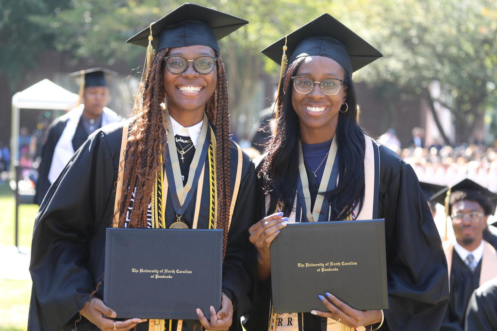 Twins Adrienne and Brittany Best earned their degrees at Spring Commencement at UNC Pembroke on May 6, 2024